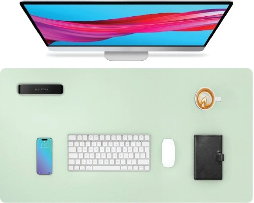 Aothia light green PU leather desk pad setup with keyboard, mouse, monitor, and color swatches