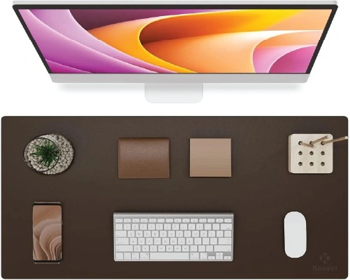 Knodel brown leather desk pad setup with keyboard, mouse, and monitor