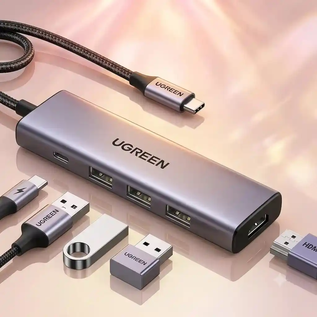 UGREEN USB-C hub with flash drives, USB cables, and HDMI adapter.